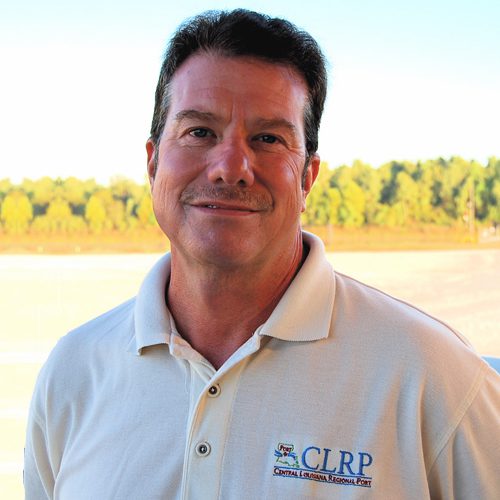 A smiling man wearing a polo shirt with the central louisiana regional port (clrp) logo embroidered on it.